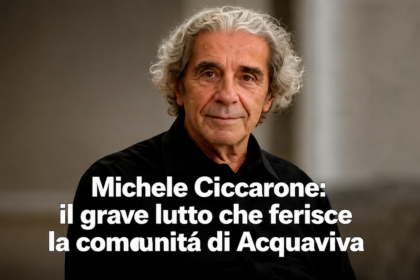 Michele Ciccarone seduto in prima fila durante un evento culturale ad Acquaviva delle Fonti.