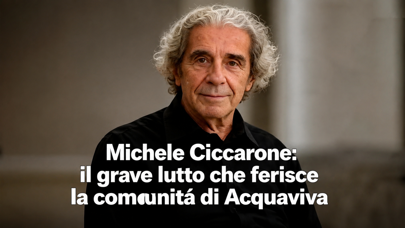 Michele Ciccarone seduto in prima fila durante un evento culturale ad Acquaviva delle Fonti.