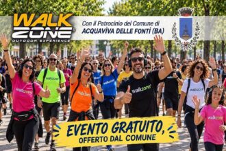 Partecipanti alla camminata WalkZone Acquaviva delle Fonti con cuffie wireless in Piazza Garibaldi